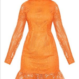Bright orange lace dress.